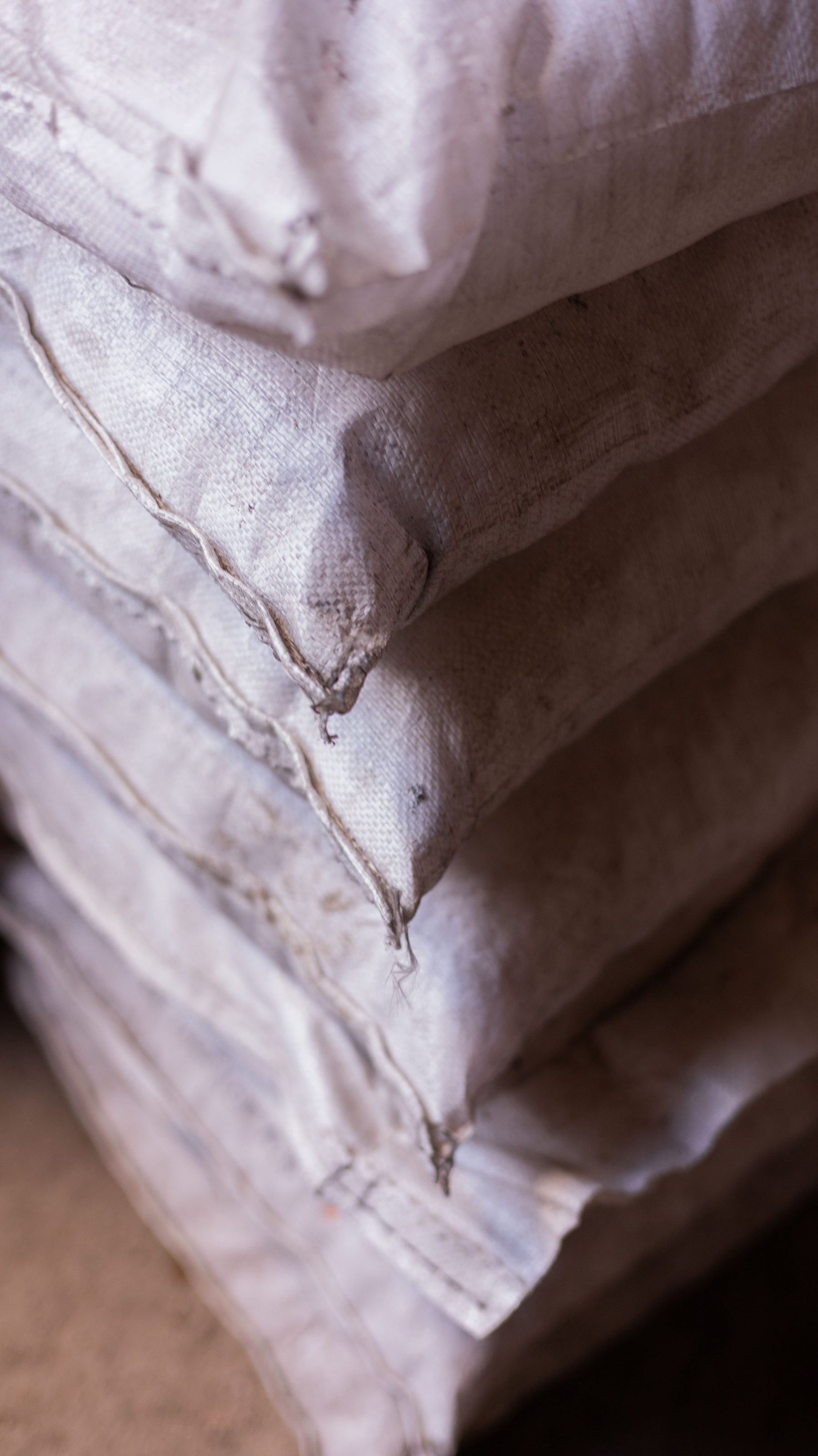 Stacked export sacks in a warehouse